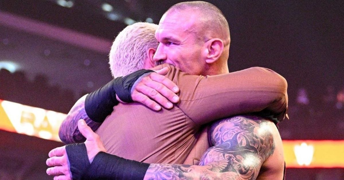 Orton & Rhodes hugging each other