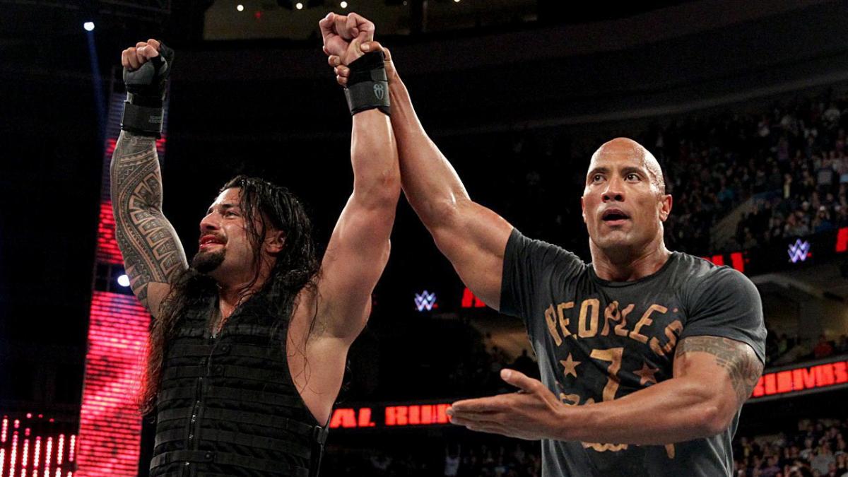 Roman Reigns celebrates with The Rock after winning the 2015 Royal Rumble